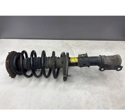 Volvo XC90 Front shock absorber with coil spring 31277877