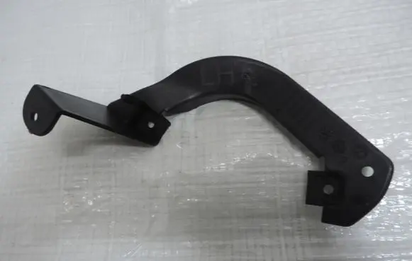 Opel Corsa D Fog light bracket 13345360