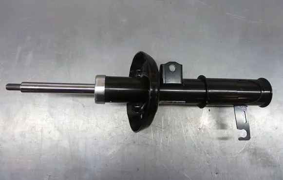 Volkswagen Touran I Front shock absorber/damper 13412594