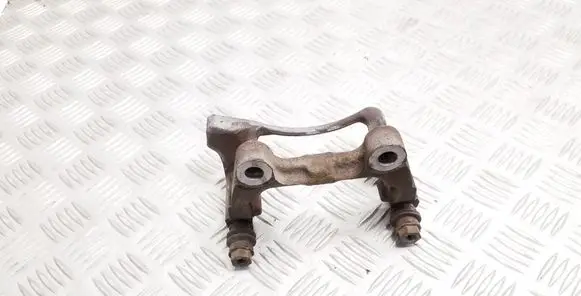 Volkswagen PASSAT B7 Brake caliper pad carrier rear 0107A