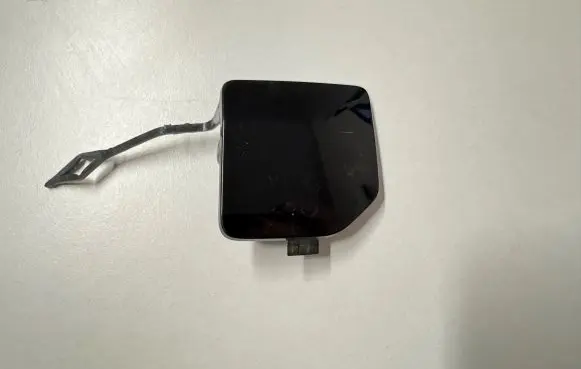 Rear bumper row hook cap/cover