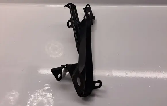 Radiator support slam panel bracket