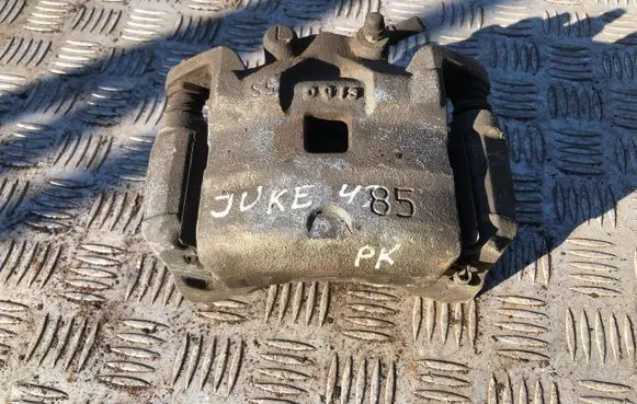 Nissan Juke I F15 Front brake caliper