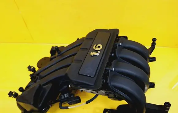 Volkswagen Touran I Intake manifold 06A133206AN 06A133185LE