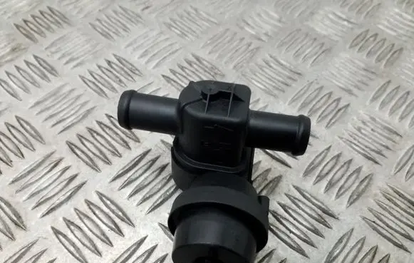Coolant heater control valve