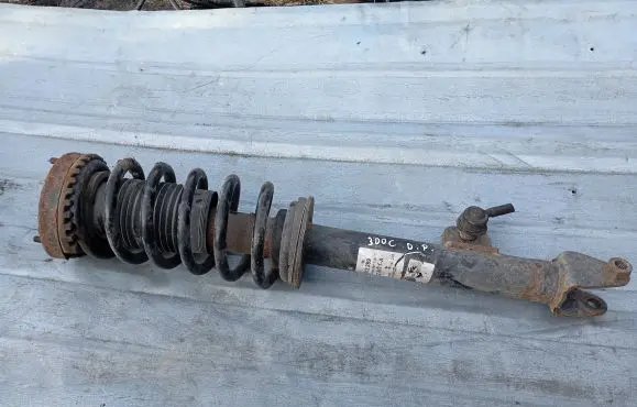 Chrysler 300 - 300C Front shock absorber with coil spring 04895627AB