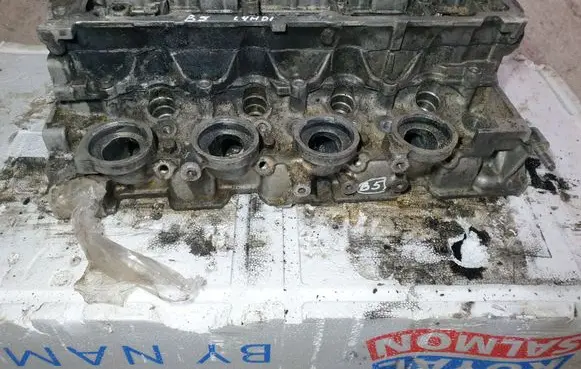 Peugeot 206 Engine head 9643477110