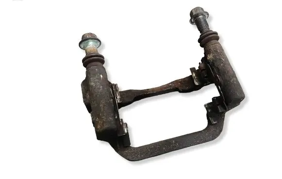 Nissan Qashqai+2 Brake caliper pad carrier rear 