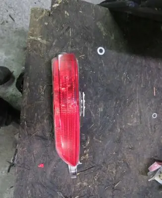 Volkswagen Touareg II Rear bumper light 