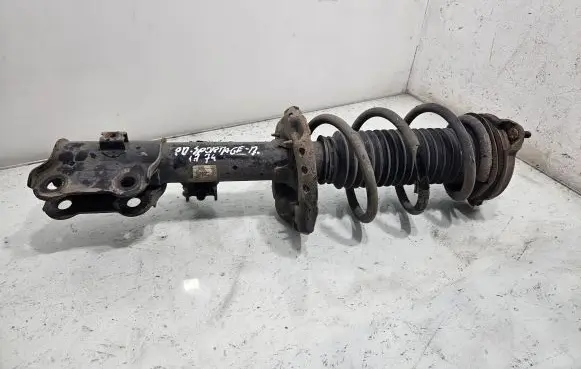 KIA Sportage Front shock absorber with coil spring T16H11A1274