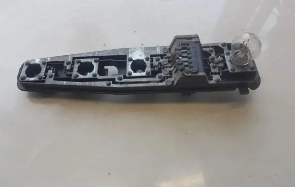 Opel Vectra B Tail light bulb cover holder