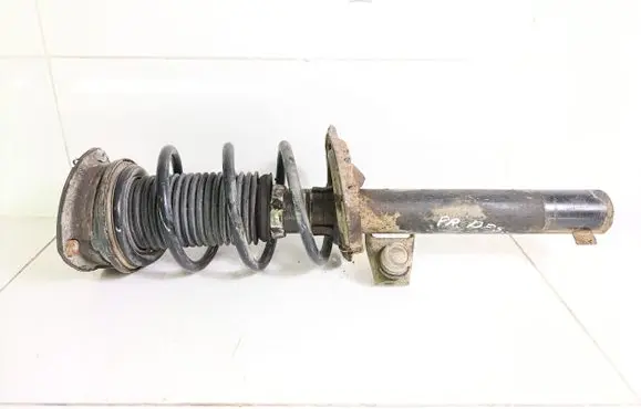 Volkswagen Golf VII Front shock absorber with coil spring 5Q0412014