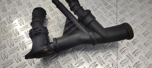 Volkswagen Touran III Engine coolant pipe/hose 04L121026F 04L121071E