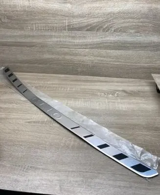 Rear bumper trim bar molding