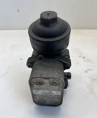 Volkswagen Jetta VI Oil filter mounting bracket 03L117021C