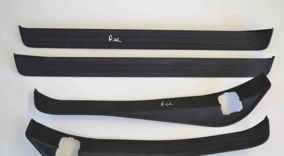 Subaru Outback sill trim set (inner) 94060AG050 94061AG030