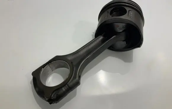 Piston with connecting rod