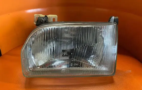 Ford Escort Headlight/headlamp 1AF960723
