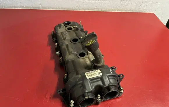 Rocker cam cover