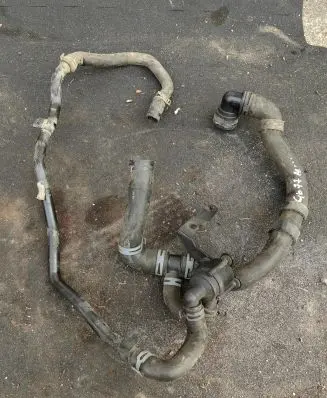 Volkswagen Golf VI Engine coolant pipe/hose 5N0965561 1K0145762JG