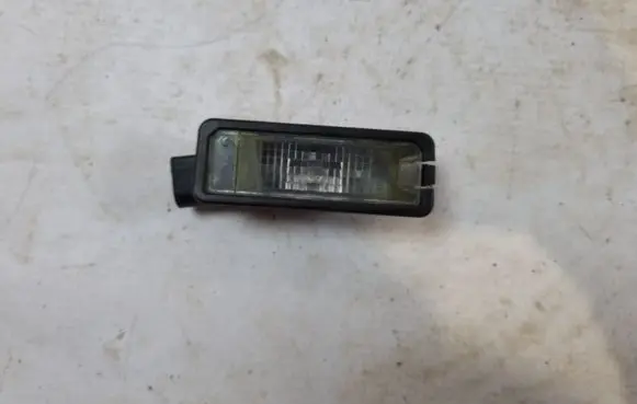 Volkswagen Golf VI Number plate light 1K8943021