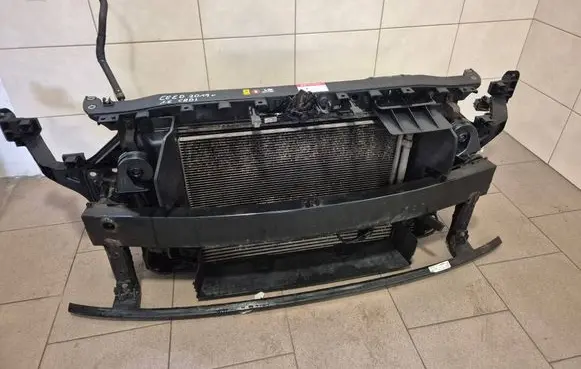 Radiator support slam panel