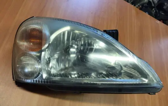 Suzuki Liana Headlight/headlamp 10032662