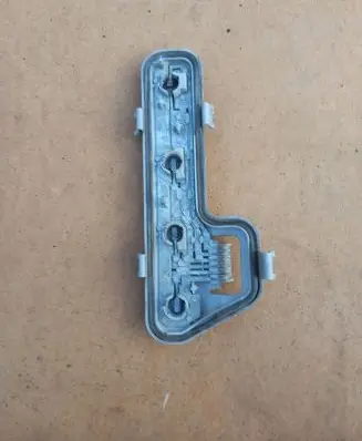 Tail light bulb cover holder