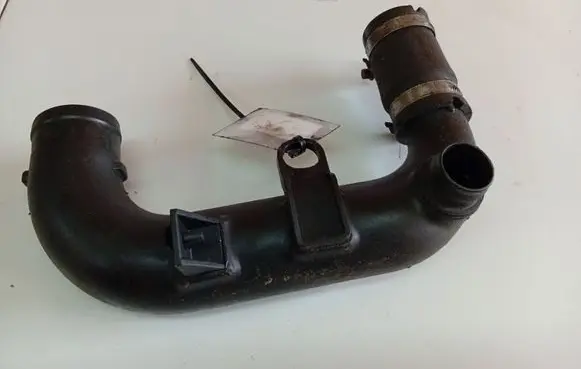 Opel Corsa D Air intake hose/pipe 55557415