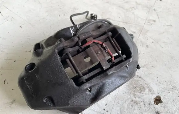 Volkswagen Touareg I Front brake caliper 209236051A