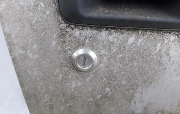 Mitsubishi Lancer Front door lock (next to the handle) 