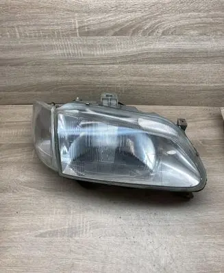 Renault Megane I Headlight/headlamp 7701672735 7700831463H