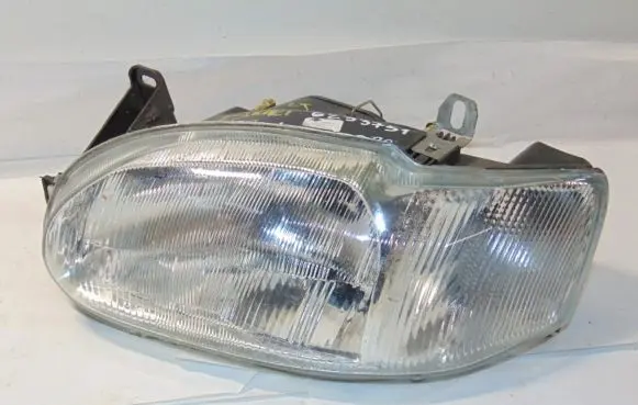 Ford Escort Headlight/headlamp 1046881 95AG13W030FC 00605700
