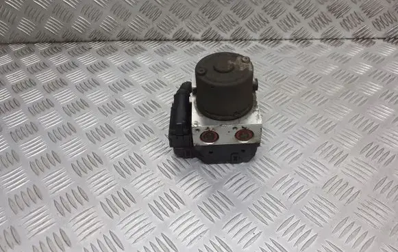 KIA Carens I ABS Pump 0K2C1437A0