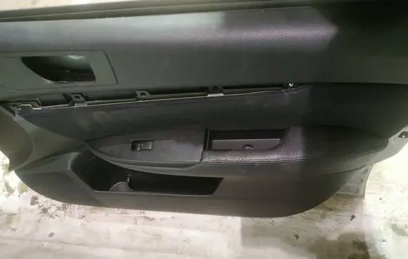 Subaru Outback Front door card panel trim
