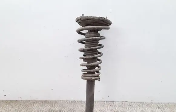Nissan Primera Front shock absorber with coil spring
