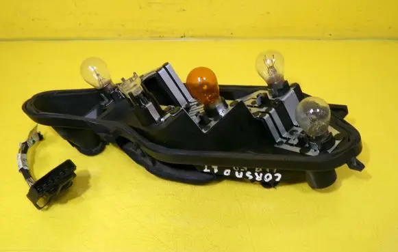 Opel Corsa D Tail light bulb cover holder 89037872A