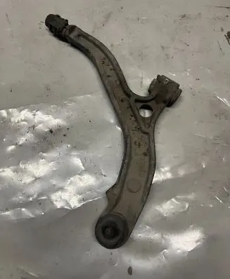 Chrysler Grand Voyager IV Front lower control arm/wishbone 04694972AB