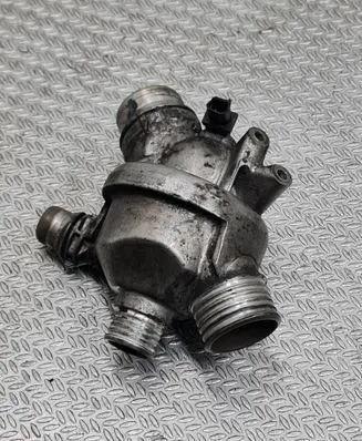 Thermostat/thermostat housing