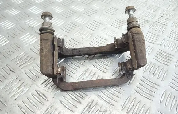 Toyota Yaris Front Brake Caliper Pad/Carrier 