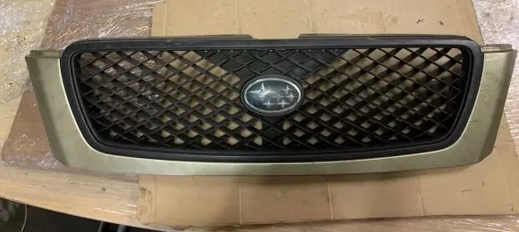 Subaru Forester SF Front bumper upper radiator grill 91065FC090
