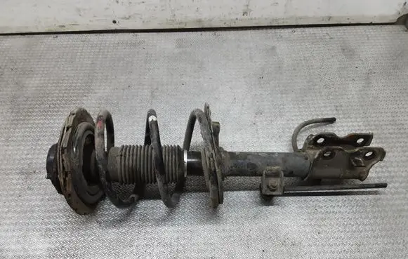Front shock absorber with coil spring