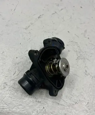 Thermostat/thermostat housing