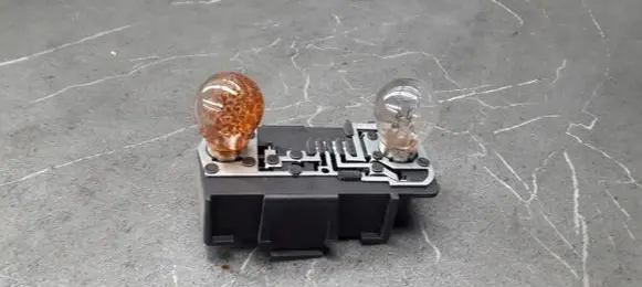 Renault Megane I Tail light bulb cover holder
