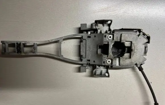 Rear door exterior handle/bracket