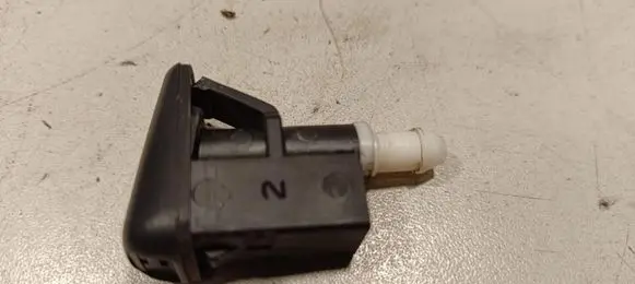 Windshield washer spray nozzle