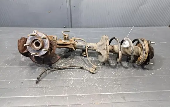 Hyundai Tucson JM Front shock absorber with coil spring