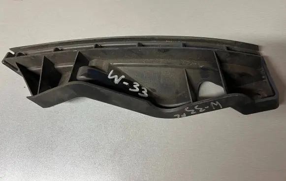 Volkswagen Touran I Front bumper mounting bracket 1T0807889A