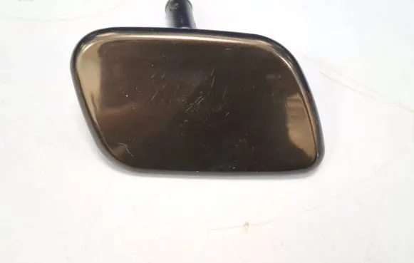 Headlight washer spray nozzle cap/cover