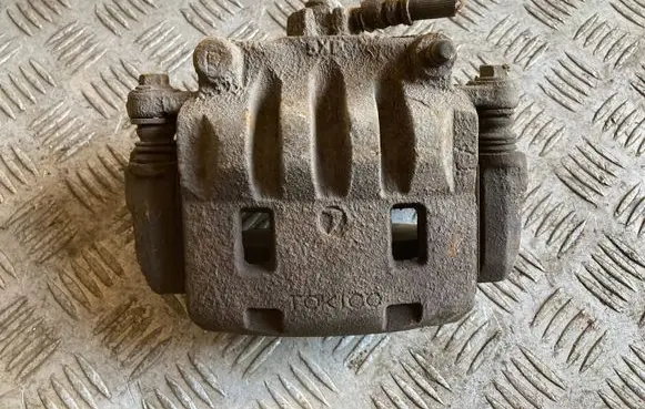 Subaru Legacy Front brake caliper